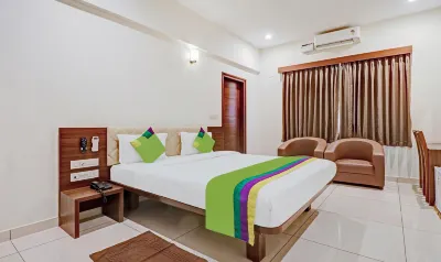 Treebo RJ Residency Hotel in zona GENIUS FIRST GRADE AND PU COLLEGE