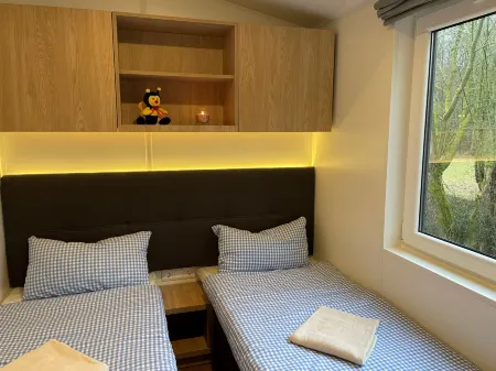 Tiny Haus Heike Отели в г. Вемдинг