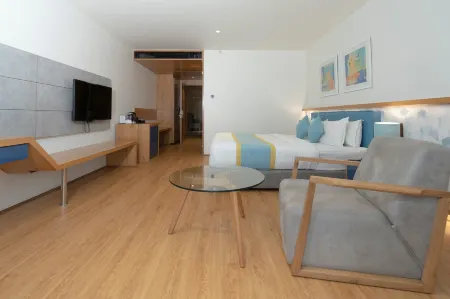 Cubix Hotel Отели в г. Дхарвад