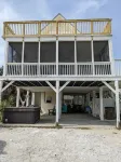 The Lucky Dog Beach House steps from the beach. - Wi-Fi