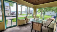 Lake George cottage with large lakefront lawn