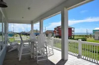 2nd row, Luxury,  Ocean view, 360 porch- 4 bedrooms, 3 baths, and sleeps 21