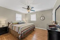 3 bedroom/2 full bath lakefront home with gentle slope to private covered dock