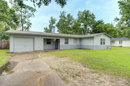 Indoor fireplace with patio and pool table