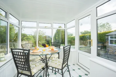 Cosy cottage with delightful private garden and summerhouse.