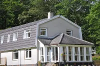 Lochside with beach access uninterrupted views of spectacular Highland Mountains