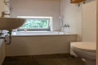 Vacation home with private sauna and private access/jetty to the Peene Hotels in Neukalen