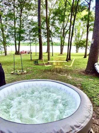 Riverfront home with hot tub, playground, kayaks, and amazing panoramic views! Отели в г. Trinity County