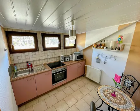 Cozy vacation apartment "Schwalbennest" under the roof with garden access