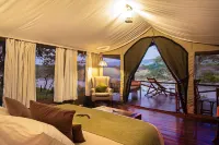 Karen Blixen Camp Masai Mara Hotels near Kichwa Tembo Wildebeest Crossing Point
