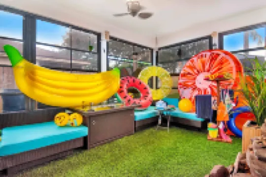 Urban Oasis W/Hot Tub, Heated Pool and Private Movie Theater 2 Bedroom Home by RedAwning