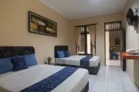 Miraa Guest House & Resto Hotels near Patung Titi Banda