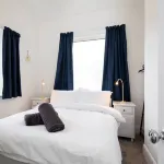 Absolute Beachfront with Decked Garden Oasis and Views