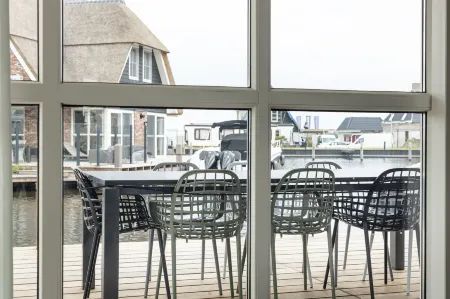 Friesland Villa with Fireplace Отели в г. Delfstrahuizen