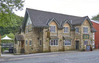 The Red Lion Hawkshaw Hotels near Delph reservoir