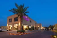 Boudl Al Nakheel Hotels near Hatib ibn Abi Balta'ah mosque