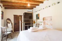 Olympia Traditional Houses Hotels in Lympia