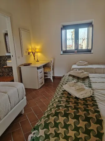 Li Guira Отели в г. Перито