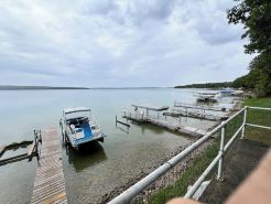 CozyStudio sitting on 2.5 acres on Hubbard Lake with WiFi, AC