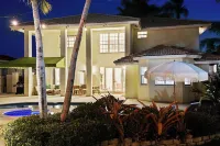 Poolside Paradise: Cozy Miami Getaway Hotels near Our Lady of Lourdes Catholic Church