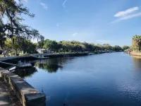 Riverfront Plum Crazy Bungalow w/boat dock! 10 min to Gulf, close to beaches!
