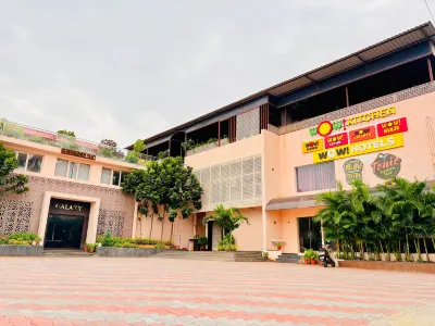 Purple  Hotels & Resorts Hotels near Arulmigu Alagumalai Murugan Temple