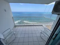 Luquillo Oceanfront Balcony Suite Near El Yunque with Private Beach Access