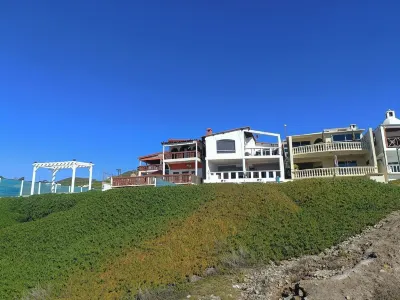 Estudio privado con fogata y vista al mar