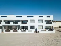 Oceanfront ground level condo on a Private Beach in a lovely resort!