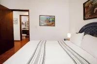Charming casa, 1 block to the beach- safe, quiet, excellent wifi, AC