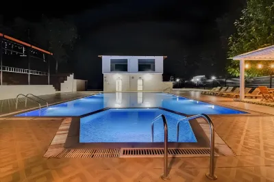 Reva Resorts & Holiday Homes Hotels near Amazon Linq store And Pan Card Service