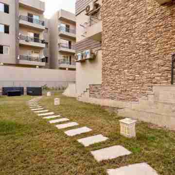 luxury 3-bedroom with private garden,shared pools in midtown compound, New Cairo Hotel Exterior