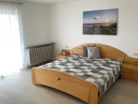 Spacious vacation apartment with balcony, fireplace & garden - near Lake Constance & Rhine Falls Hotels in Hilzingen