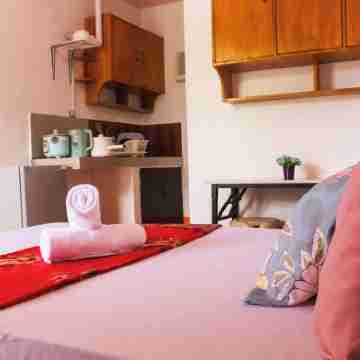 Cozy 2-bedroom apartment in charming Panglao with WiFi, AC Rooms