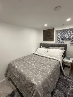 Charming 2-Bedroom Basement Retreat in Uniondale – AC, WiFi & More! Hotels near NYDJ