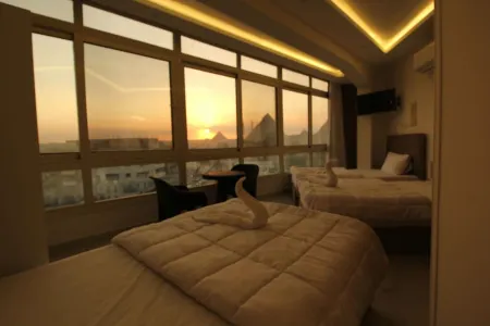 Experience Majestic Views: Luxurious Hotel Steps Away from the Pyramids