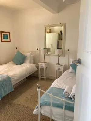 Coast Cottage - stunning sea views & large garden. Dog friendly family home Hotels near Watergate Beach