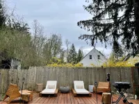 Cozy cabin with deck and fireplace steps from White Pond Lake. Dog friendly.