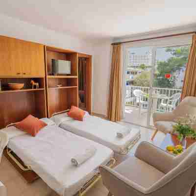 Apartamentos Cala LLonga Playa Rooms