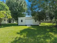 Charming 3-bedroom house/ lake, huge backyard, WiFi, fishing, 10 mins from beach