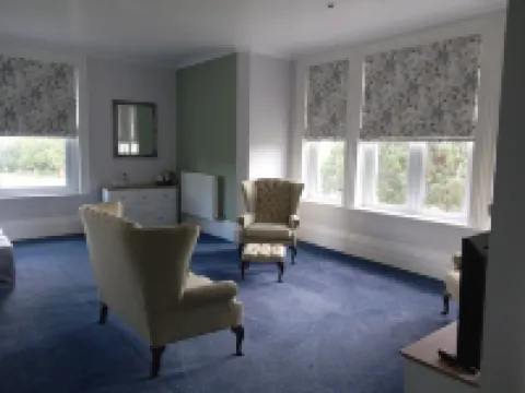 Large En-Suite Family Room with Double Aspect Scenic Views
