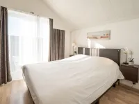 Dina with Parking and Shared Pool Hotels in De Haan