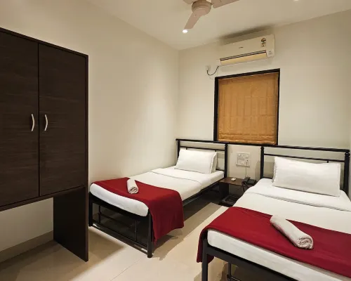 Hotel Kumkum Hotels near NICMAR