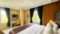 Rizen Premiere Hotel Hotel dekat Taman Wisata Matahari