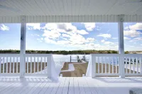 Enjoy a 3-bedroom waterfront vacation home just 10 minutes from Emerald Isle Hotels in Cedar Point