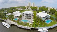 Newly Renovated modern waterfront beachhouse with 9 beds. Sleeps 18 Hotels in Mimo