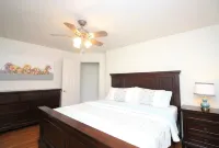 Great southside location, 2 mins to Bridges, fenced back yard, 2 car garage, AC!