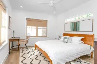 New Luxury heated pool home, steps to the beach with two master suites!