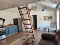 One bedroom cabin with an extra loft sleeping space minutes from the Frio River!