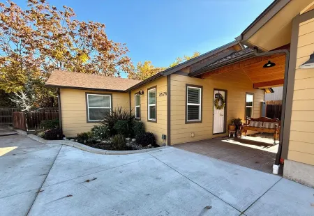 Home with gated driveway near River & Downtown